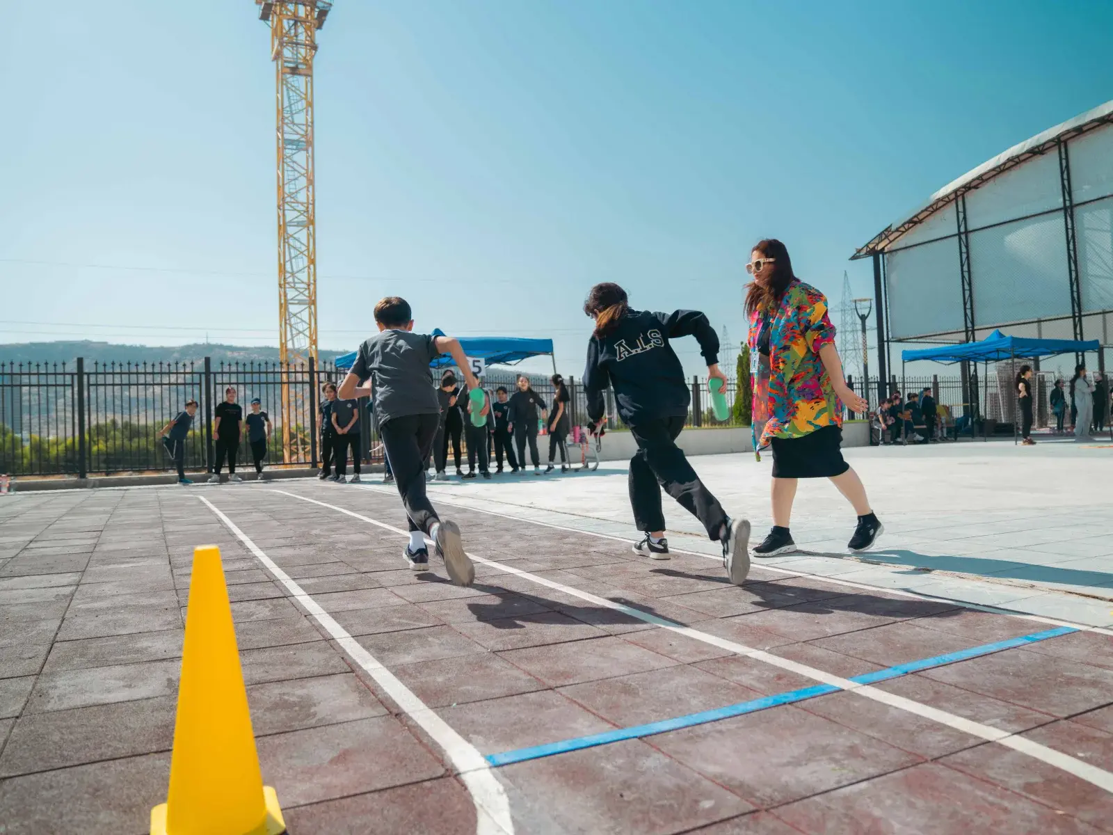 AIS students running during an athletics activity